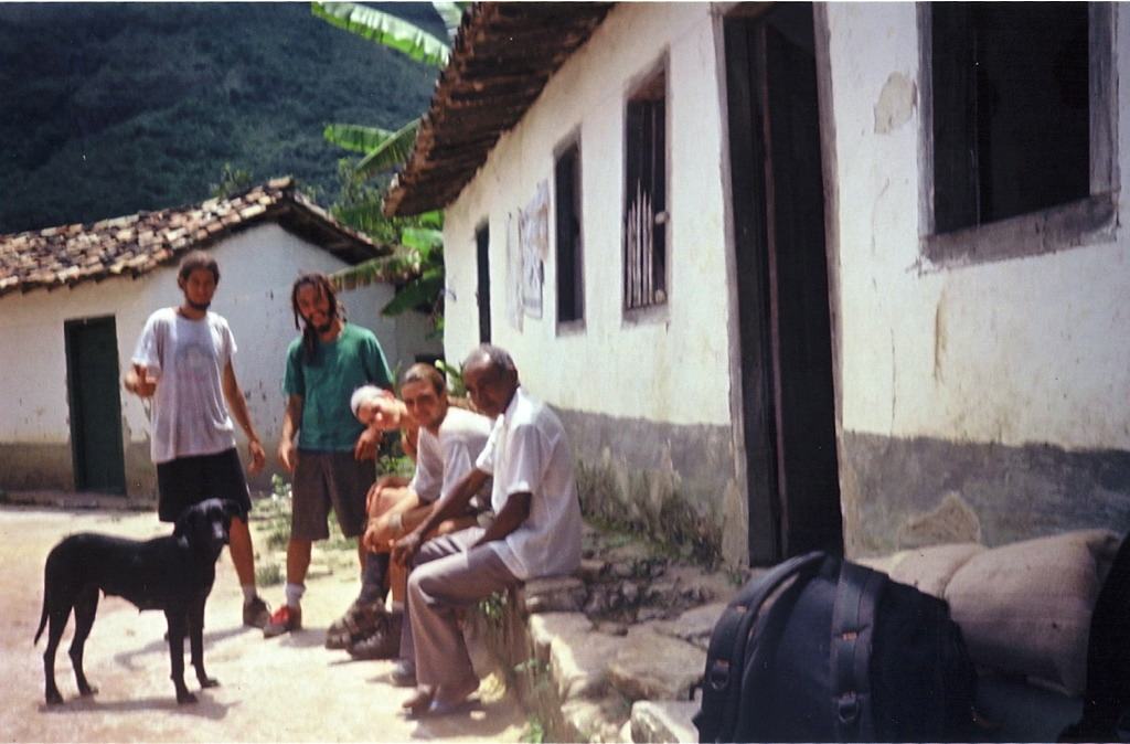 Chapada Diamantina, four men outside a whitewashed house