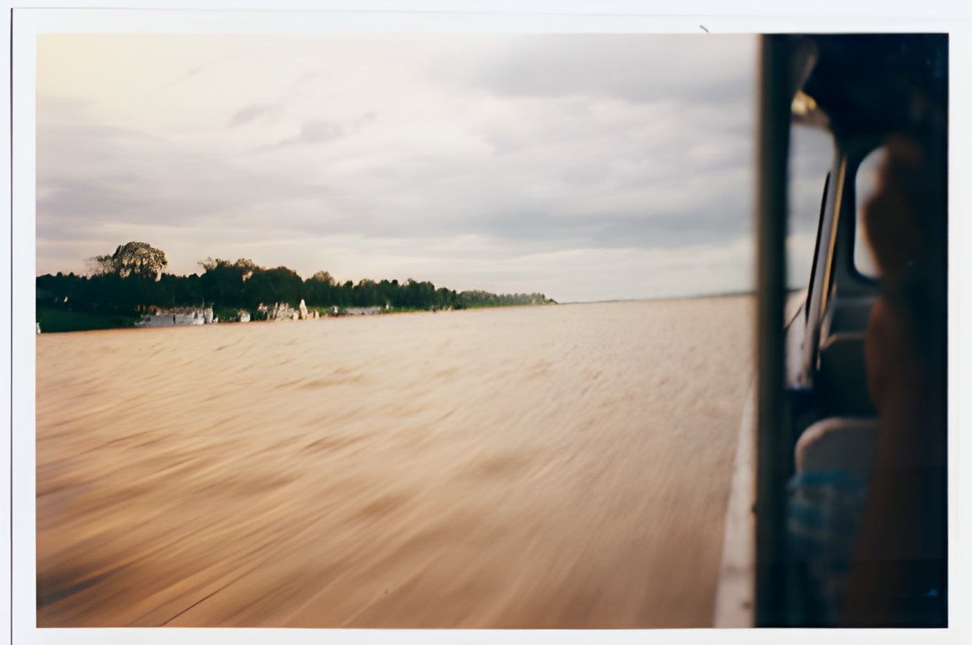 river water streaked by motion from a moving boat