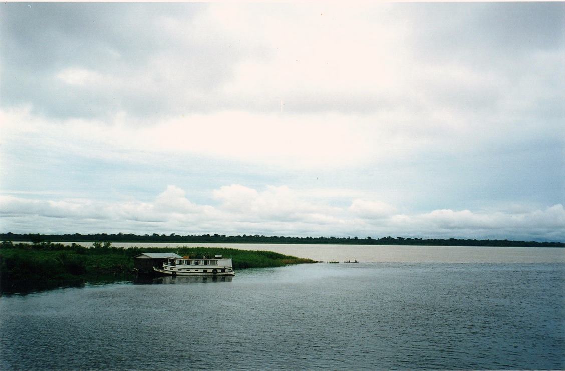 Leticia, Amazon, a houseboat on a calm river