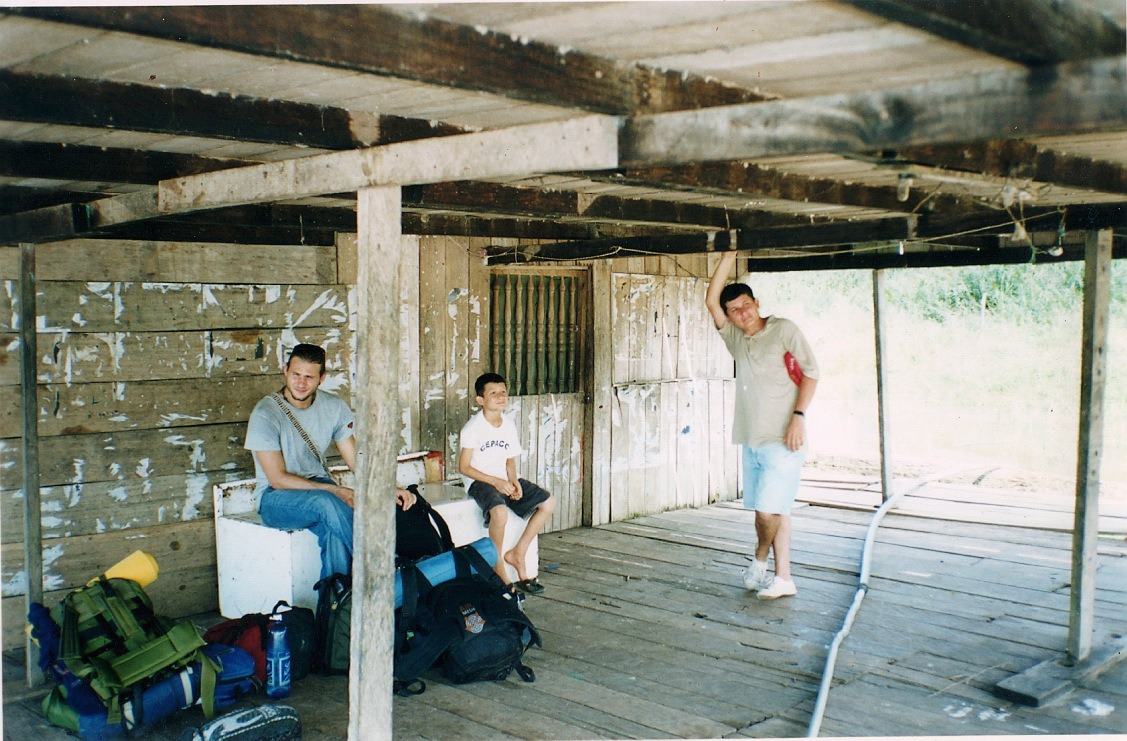 outside Leticia, waiting with backpacks for our boat
